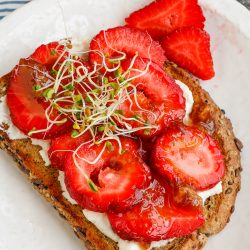 Strawberry Ricotta Toast with sprouts