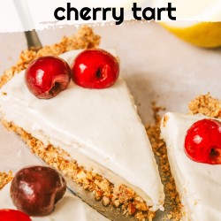 Slice of tart with cherries and a label overlay.
