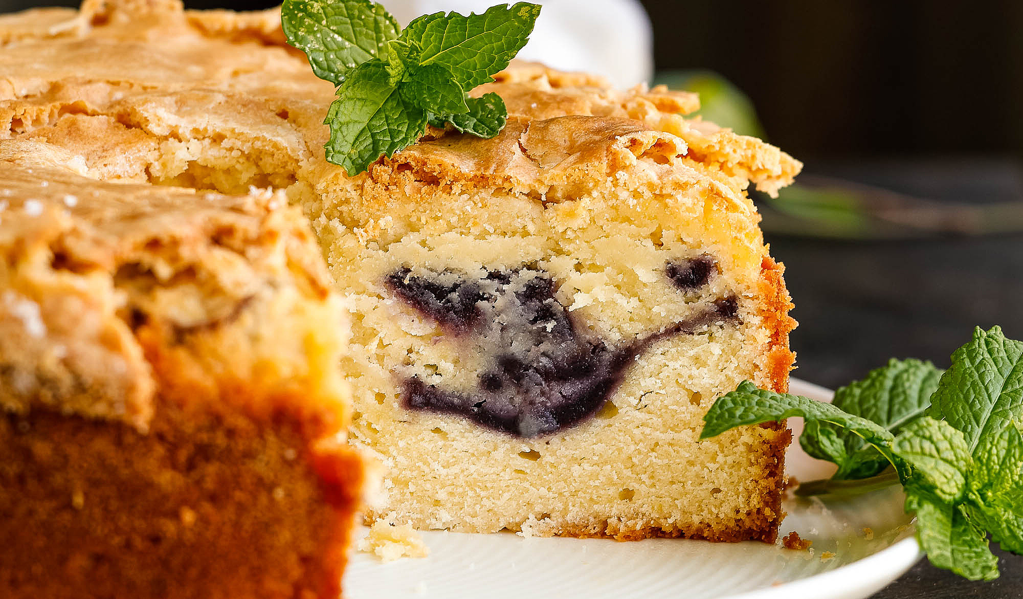 Blueberry Swirl Pound Cake with slice cut out.