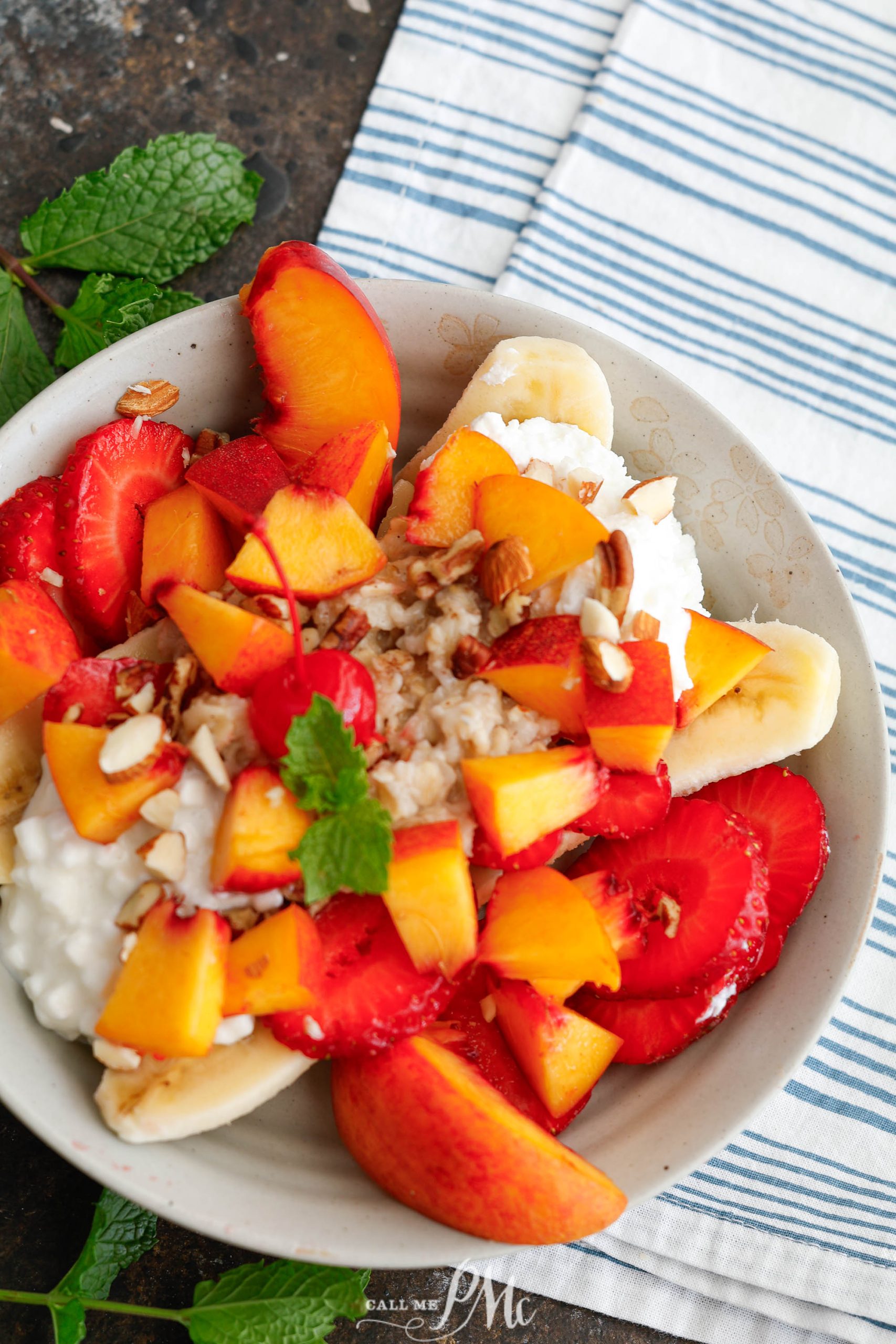 A bowl of breakfast banana split on a table.