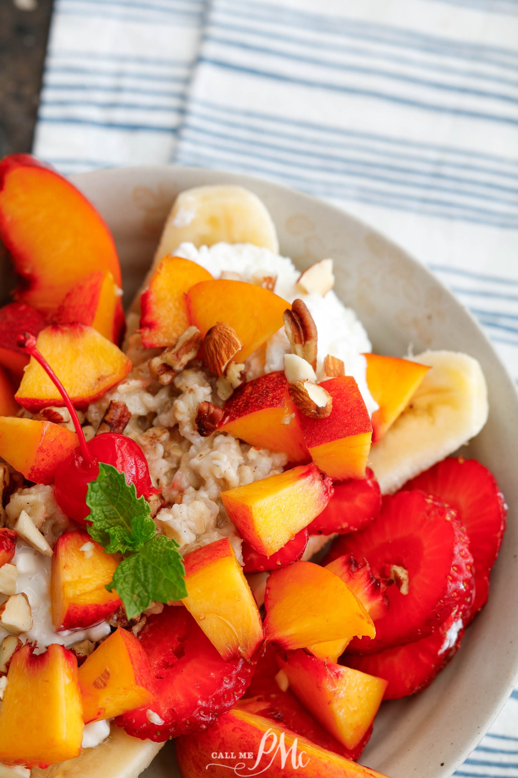 A plate topped with bananas, strawberries and granola.