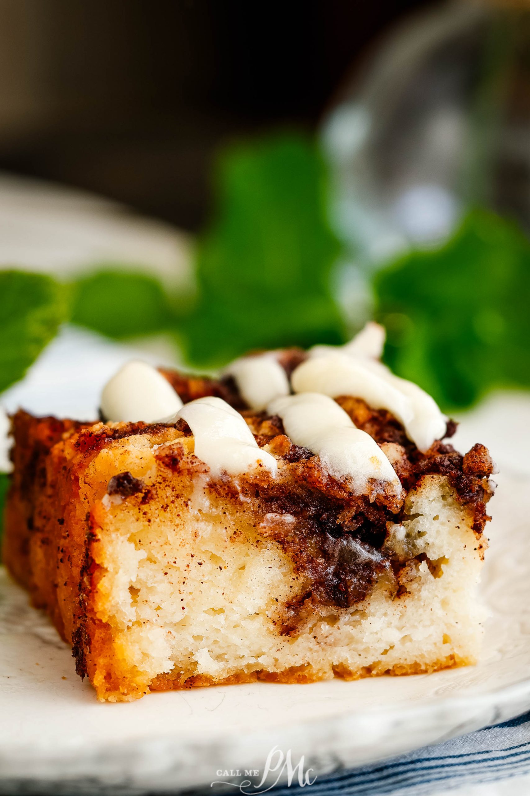 A piece of cinnamon bread on a plate.