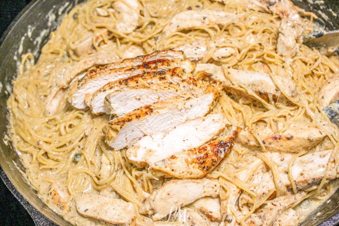 Chicken Caesar Angel Hair Pasta in a skillet.