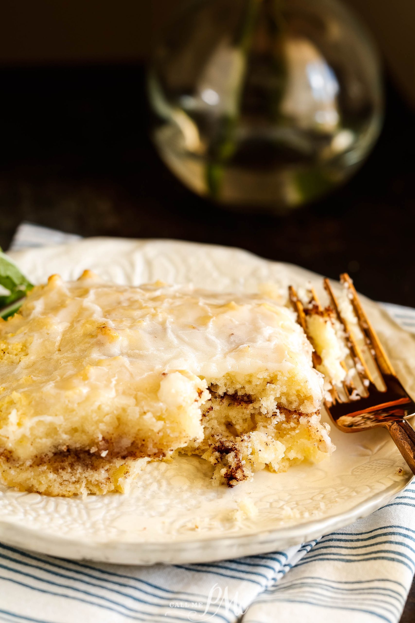 A scrumptious slice of cake with a fork.