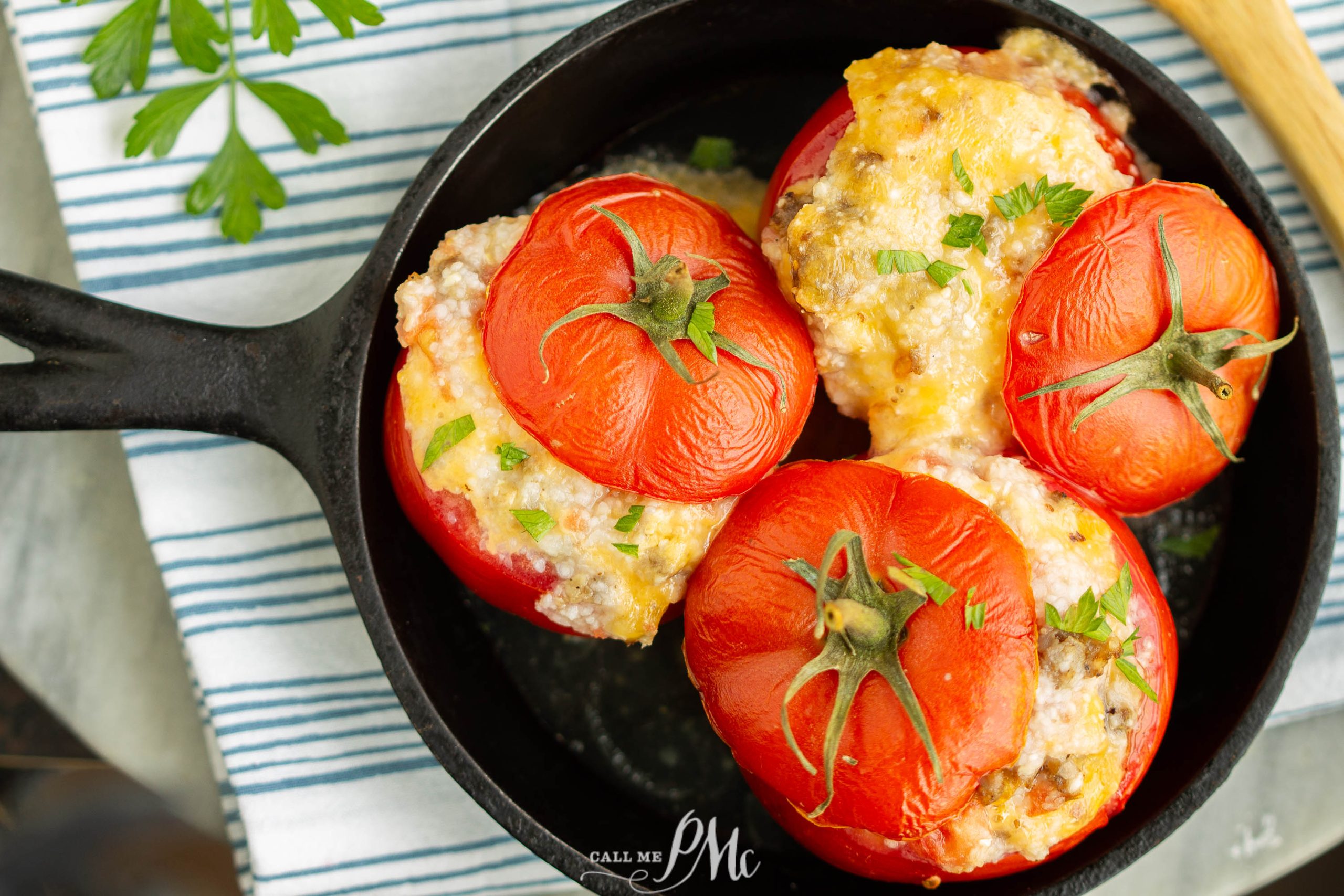 Grits Casserole Stuffed Baked Tomatoes in a cast iron skillet.