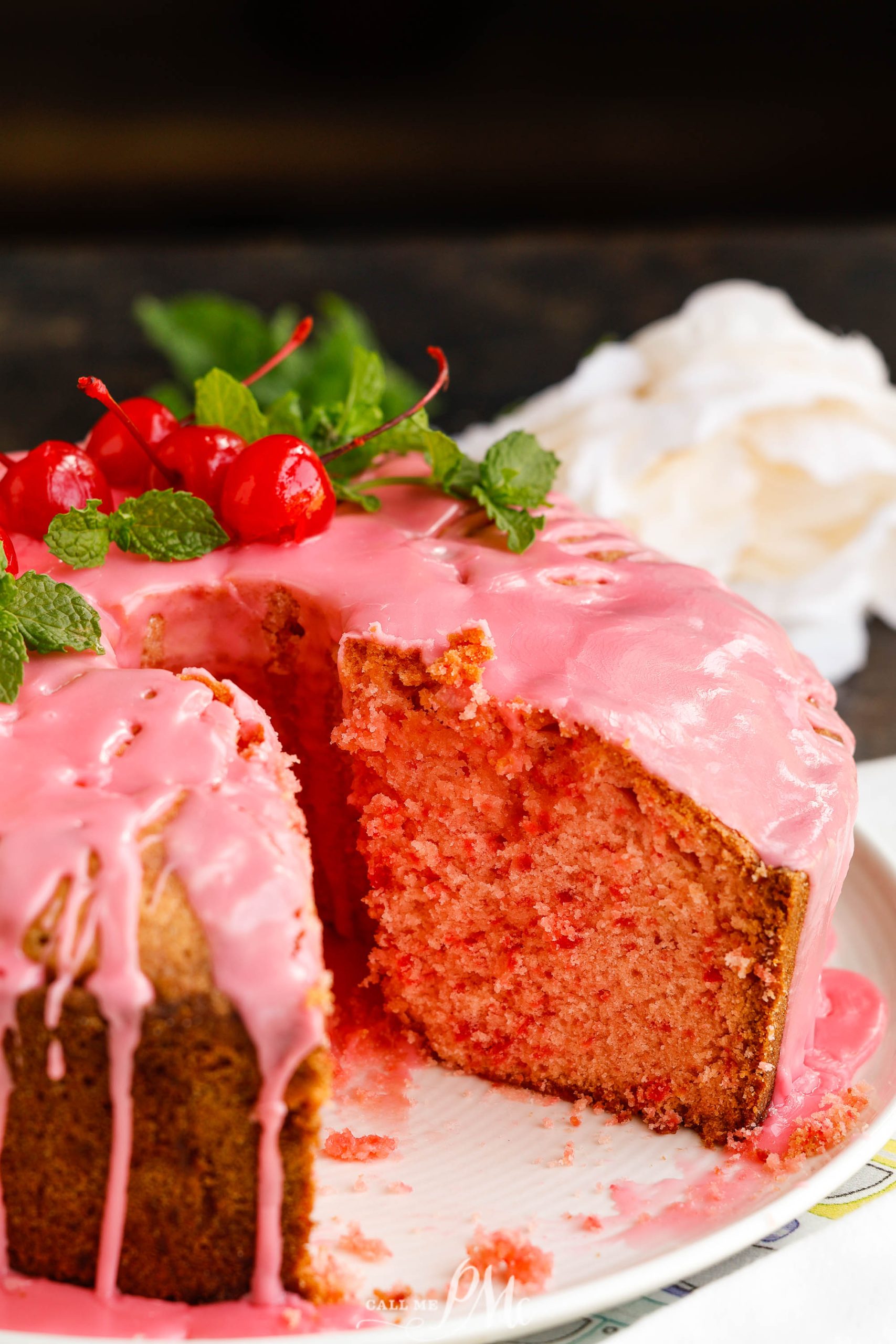 Cherry pound cake with slices out.