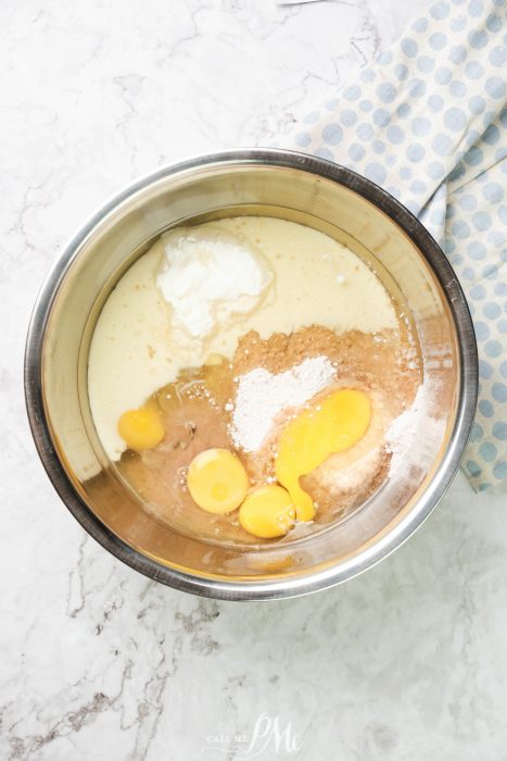 Semi Naked Orange Cake. A mixing bowl with eggs, flour and sugar.