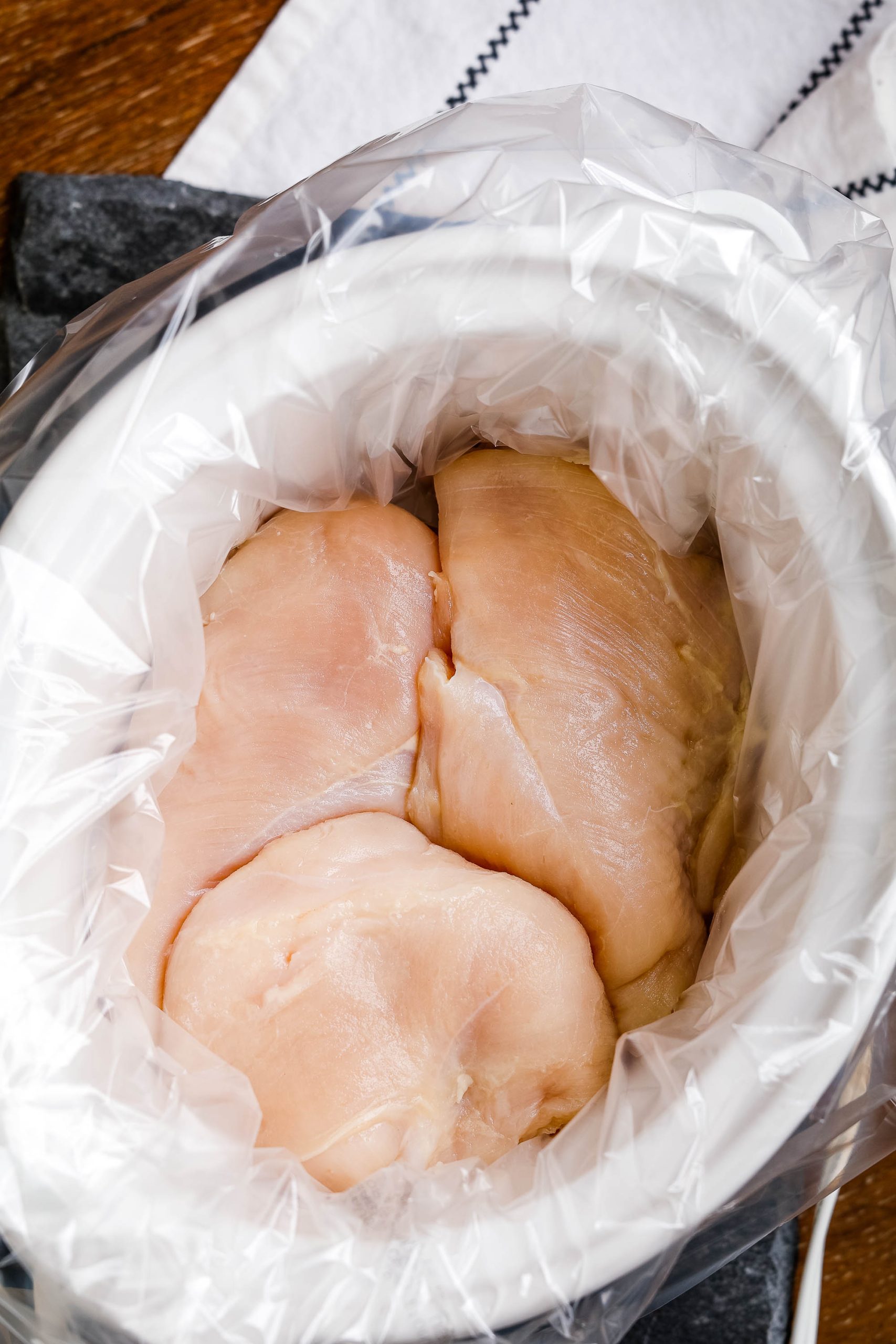 Raw chicken in slow cooker