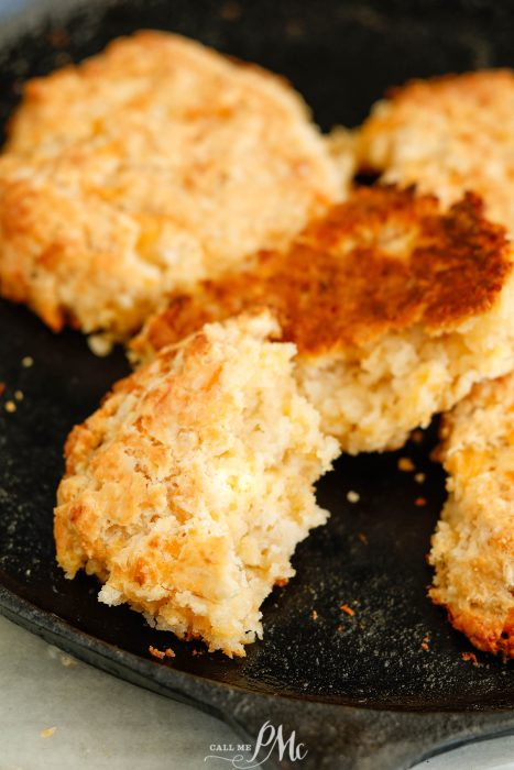 Small Batch Cheddar Biscuits in a skillet on a table.