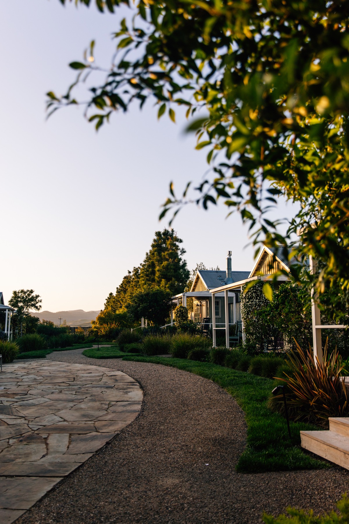 A stone path leading to a house Carneros Resort.