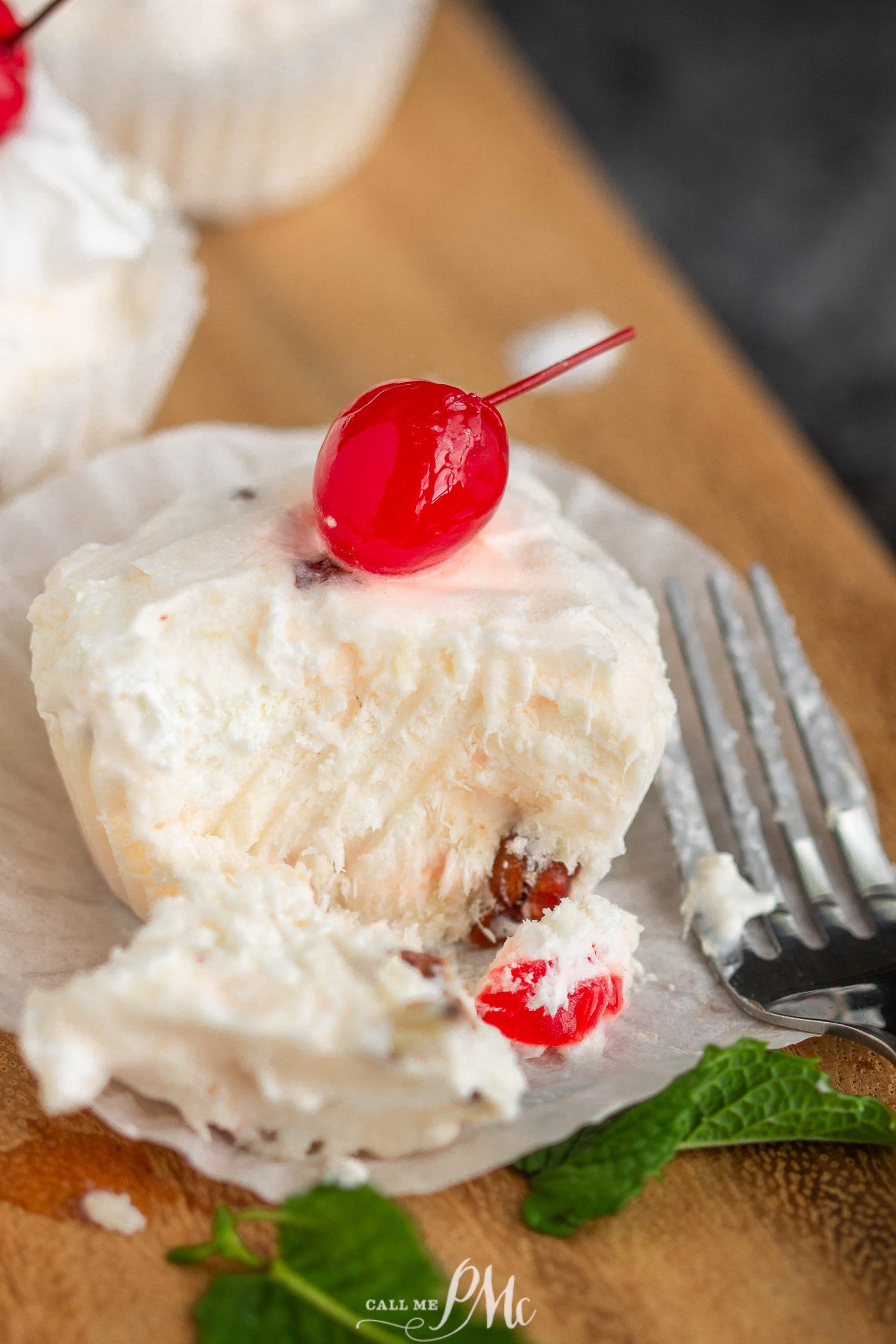 fruit cupcakes with a cherry on top.