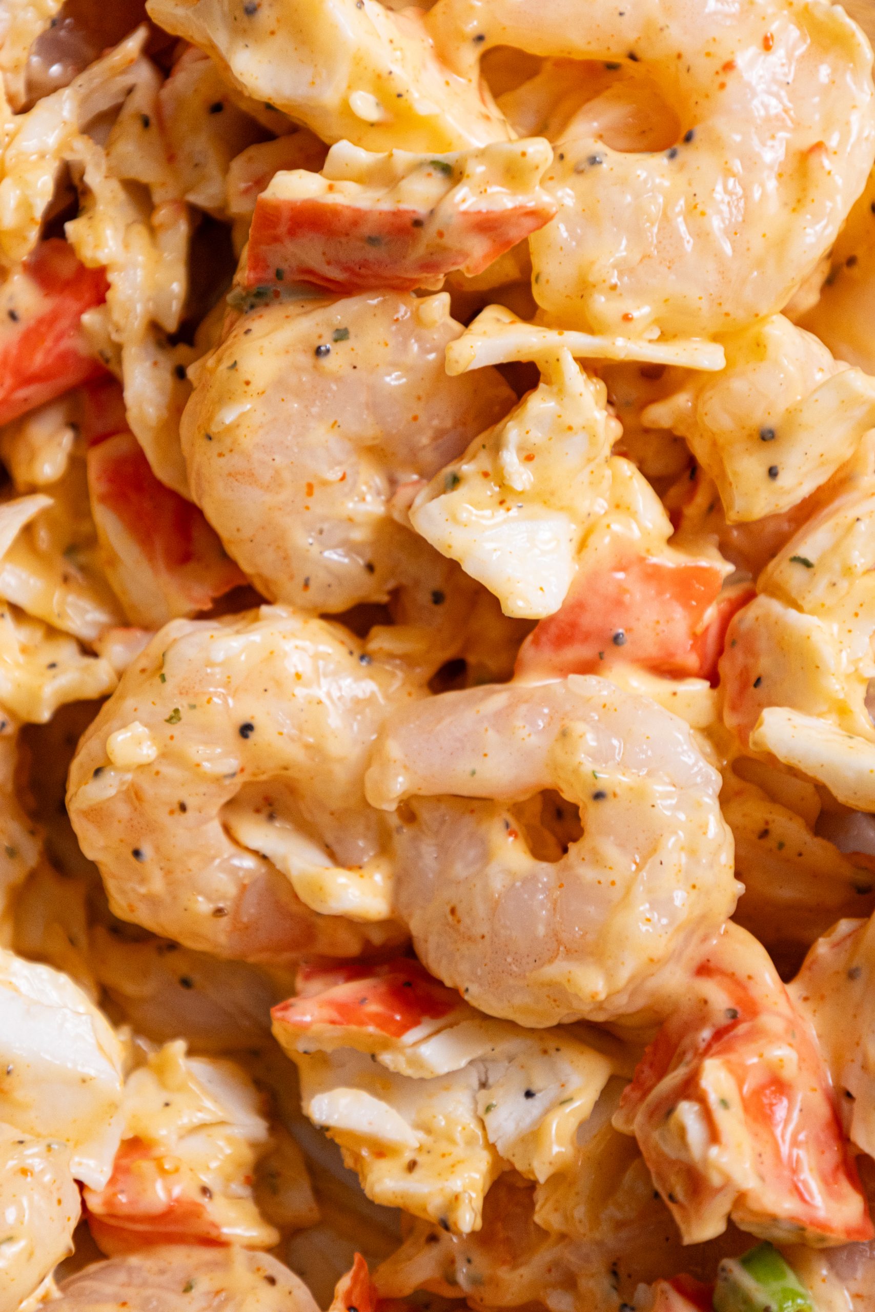 A close up of a bowl of shrimp salad.