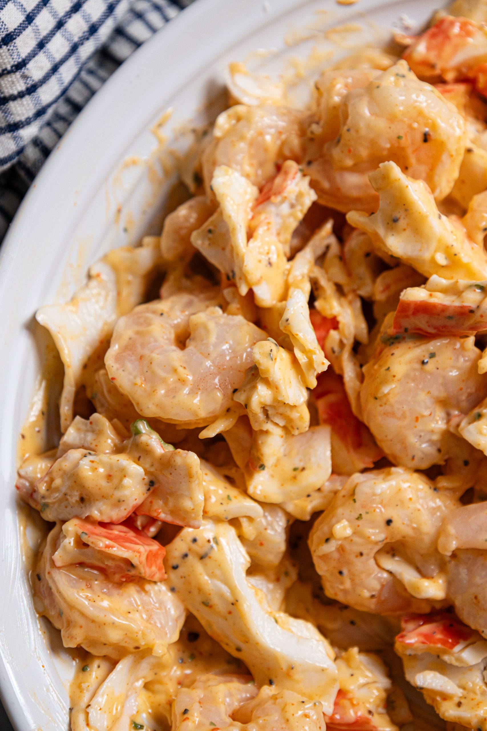 A bowl of Light Shrimp and Crab Remoulade in a white bowl.