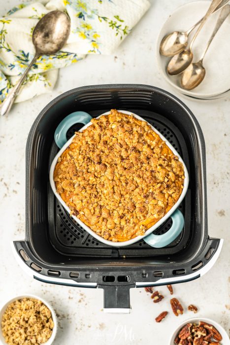 An air fryer with a casserole in it.