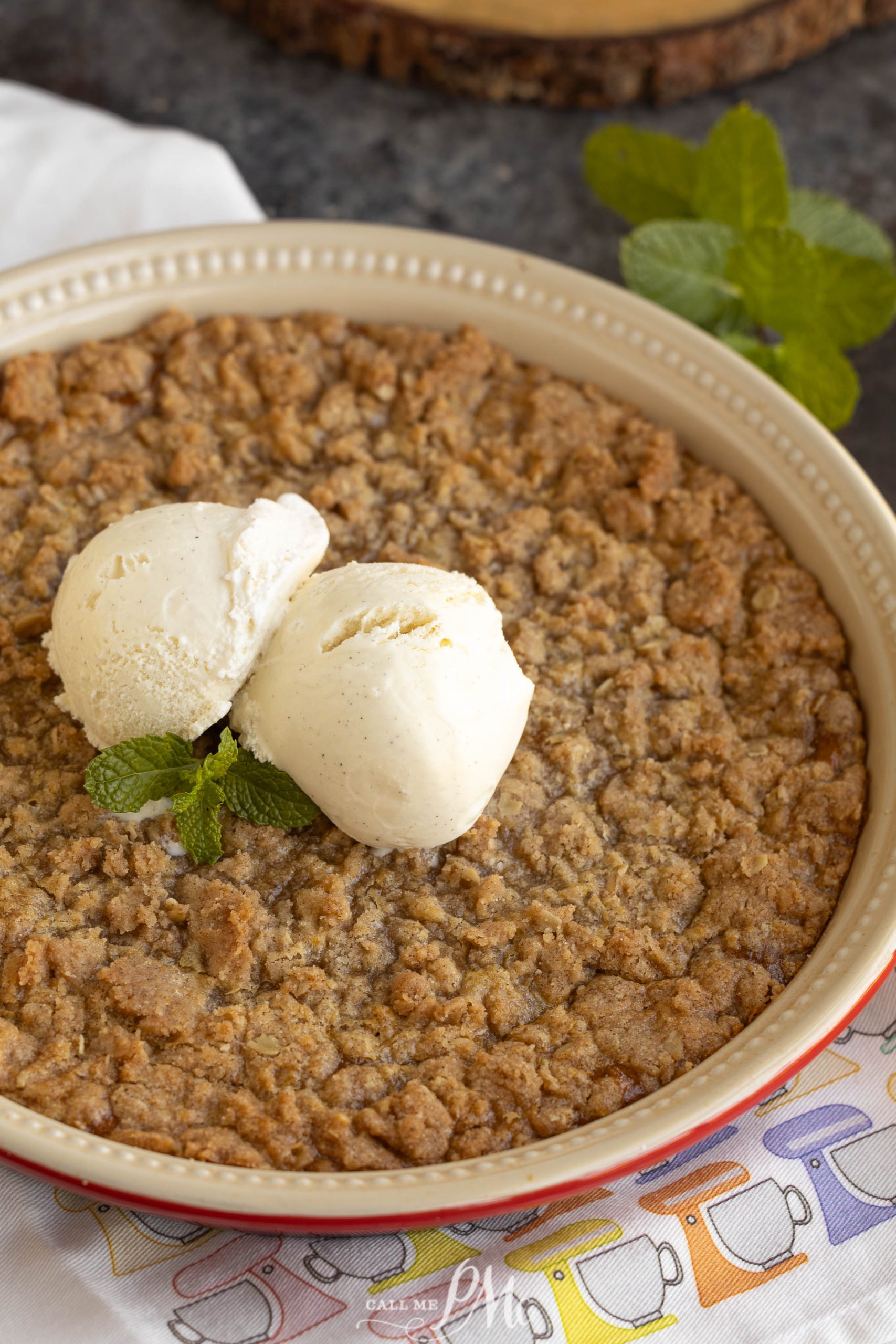 Crustless Pumpkin Pie Crumble with a scoop of ice cream on top.
