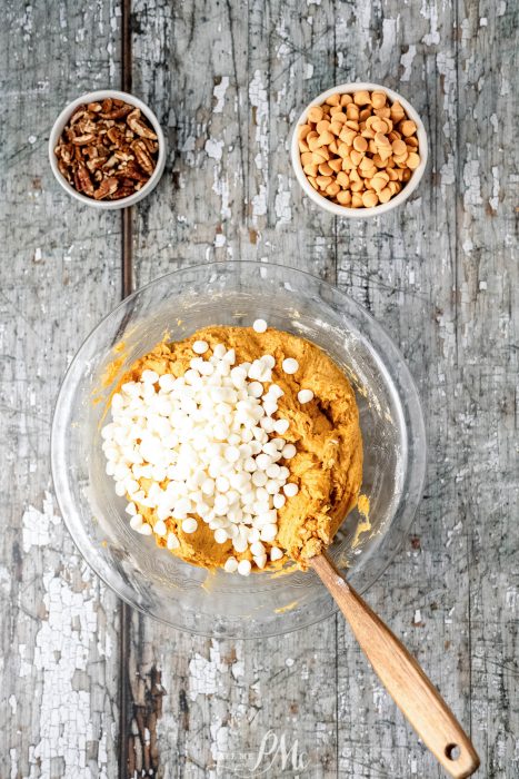 A bowl full of ingredients for a pumpkin pie.