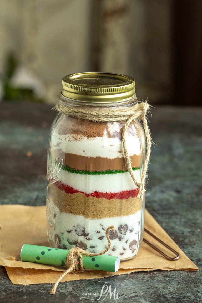 A mason jar filled with a mixture of cookies and ice cream.