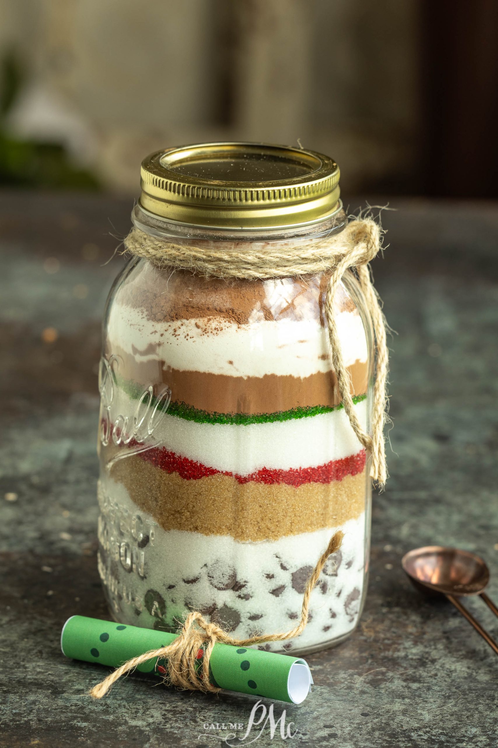 A mason jar filled with a mixture of cookies and ice cream.