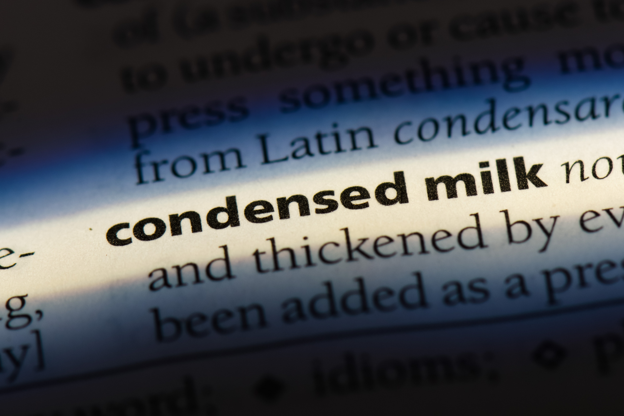 The word condensed milk is highlighted in a dictionary.