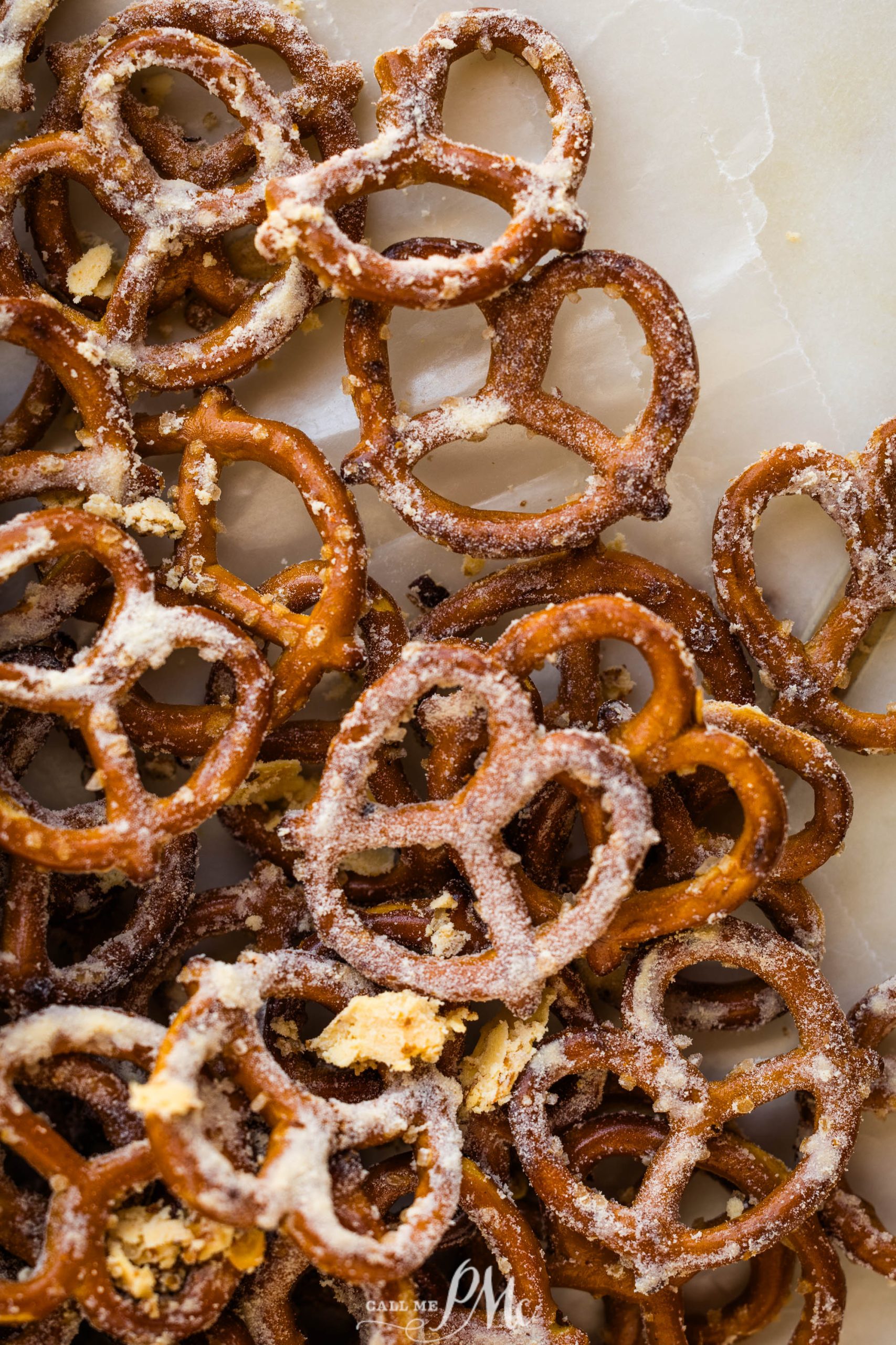 A pile of Cheddar Pretzels Recipe on a baking sheet.