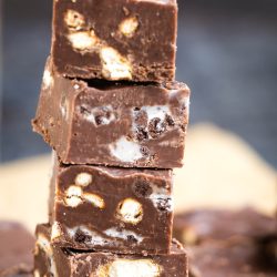 A stack of chocolate fudge stacked on top of each other.