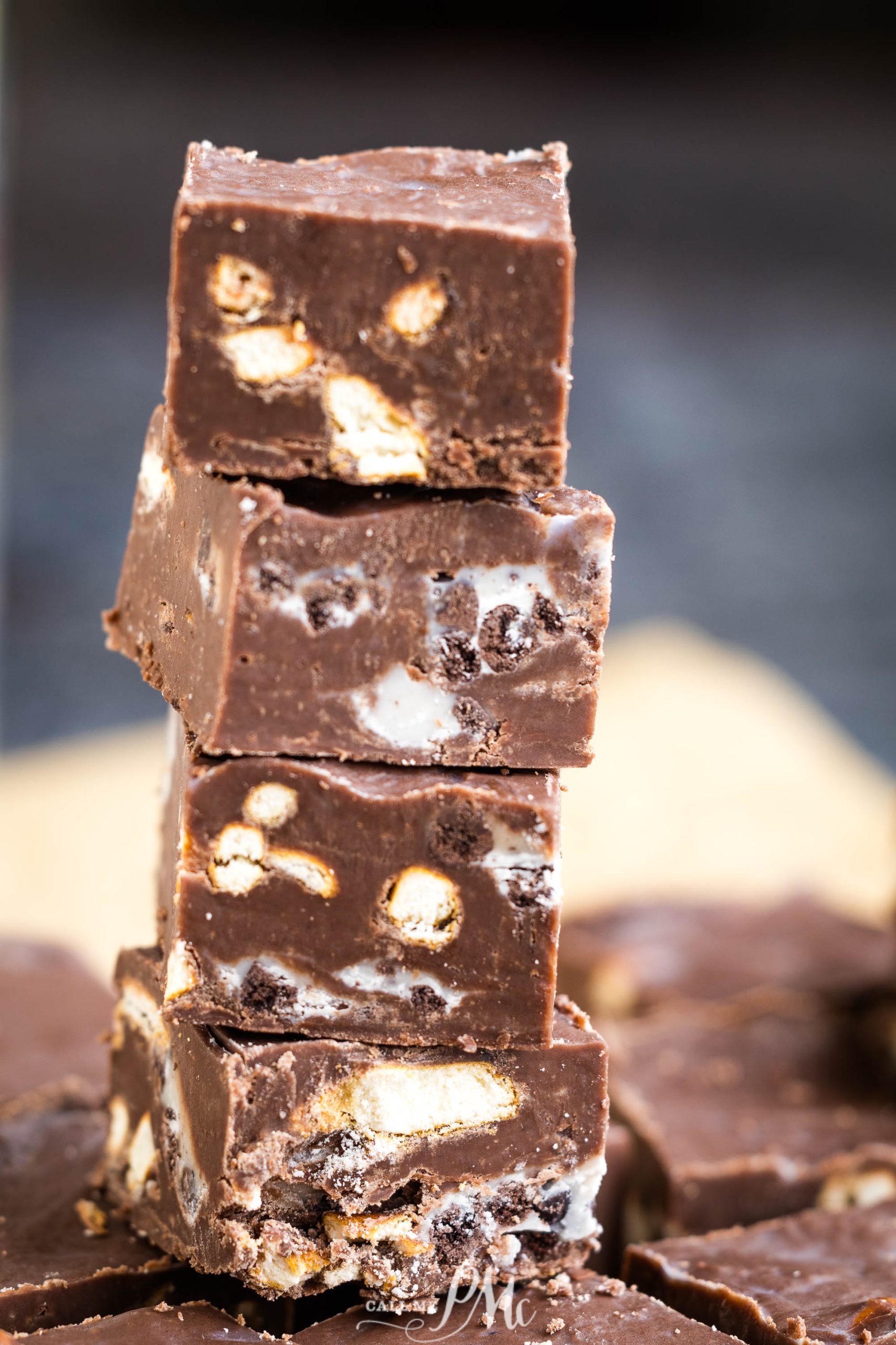 A stack of chocolate fudge stacked on top of each other.