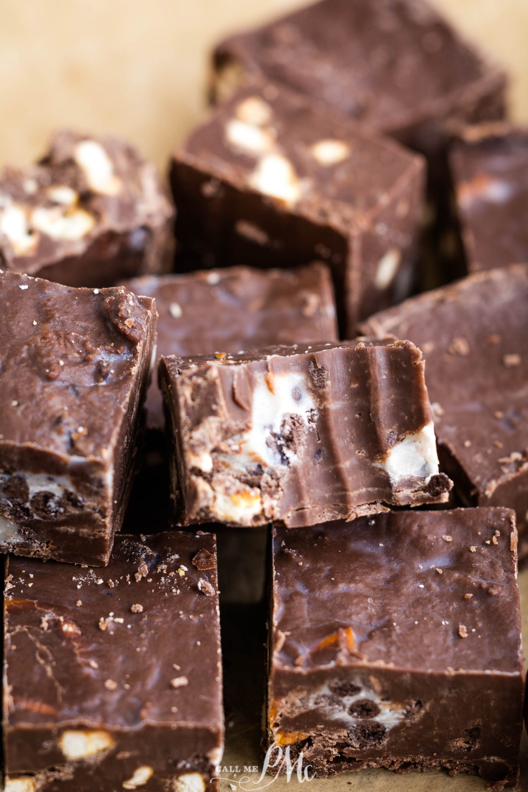 A close up of chocolate fudge on a piece of paper.