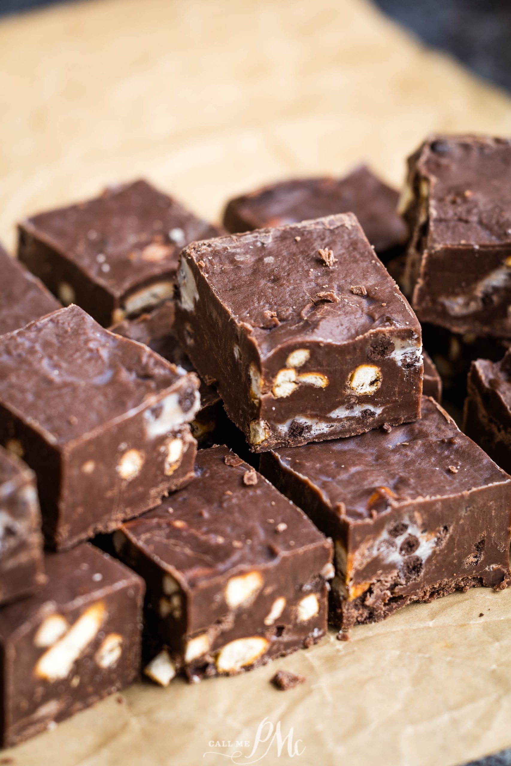 A pile of chocolate fudge on a piece of paper.