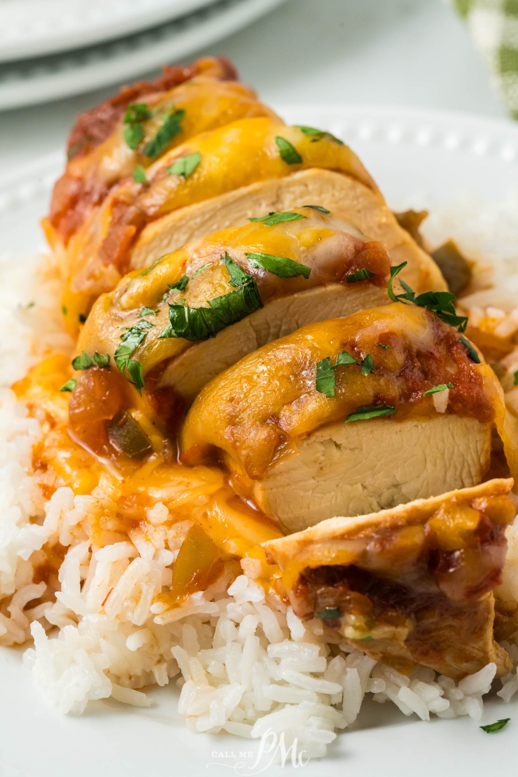 Crockpot Cheesy Salsa Chicken on a plate with rice.
