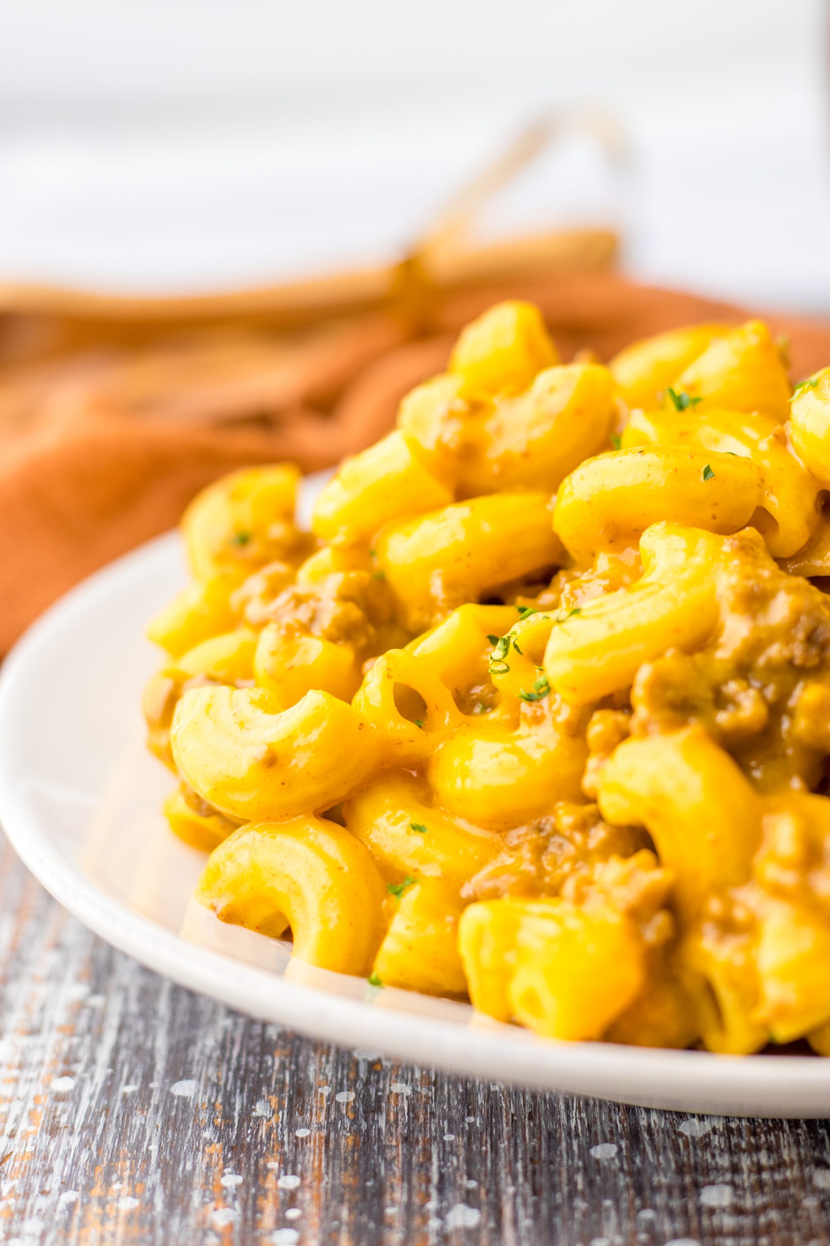 A plate of One Pot Cheesy Beef Macaroni on a table.