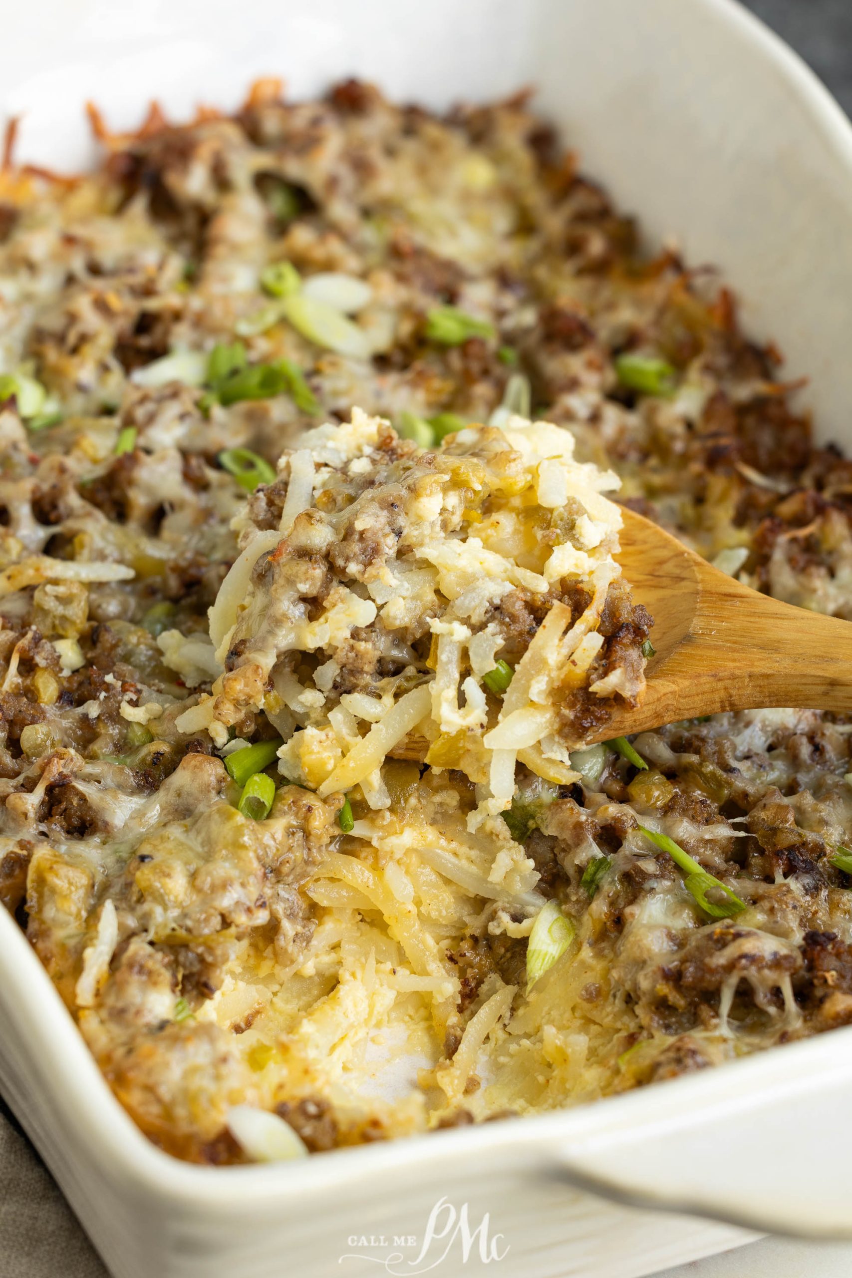 A casserole dish with a wooden spoon.