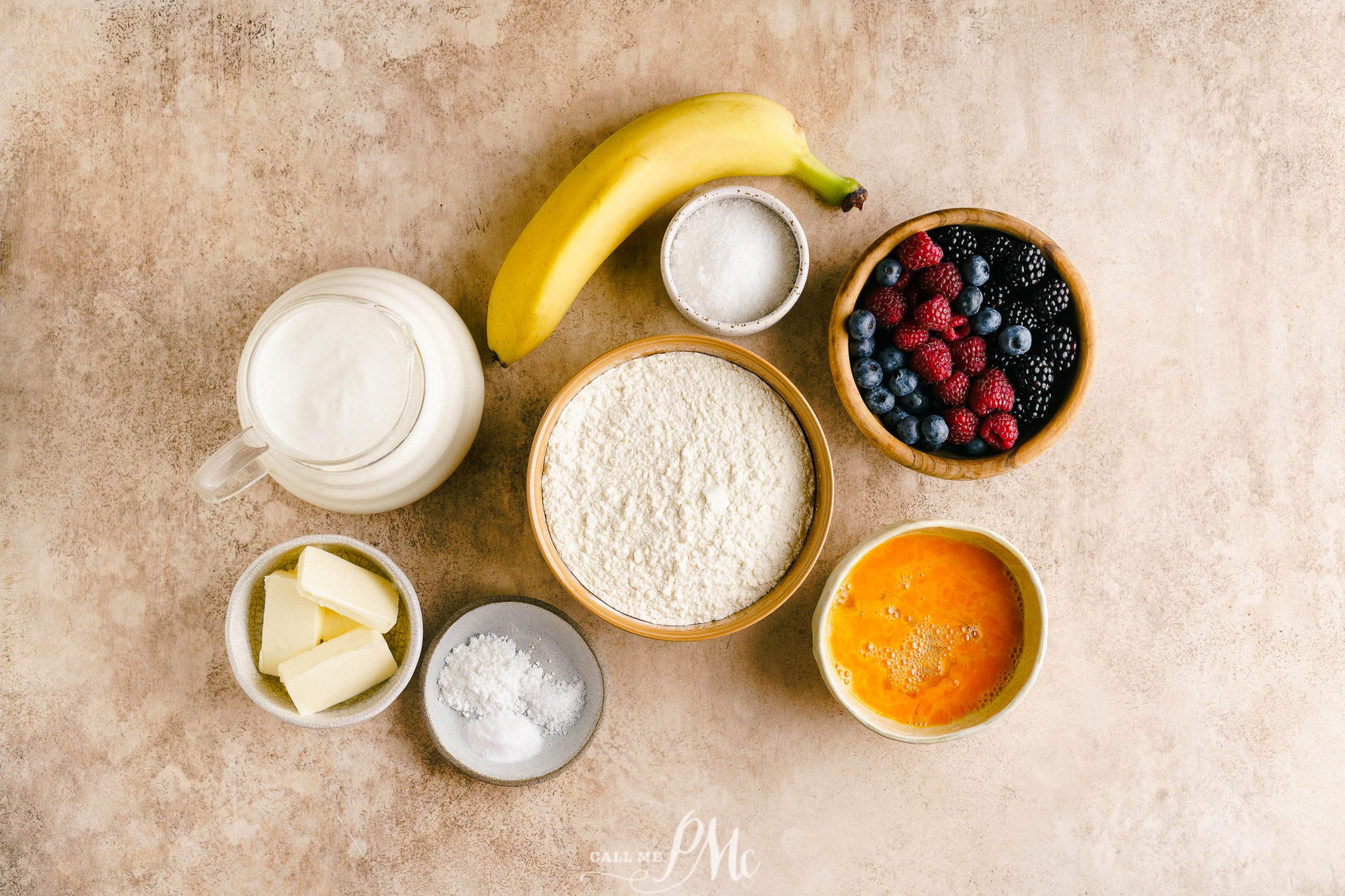 A bowl of ingredients for a sheet pan pancake breakfast.