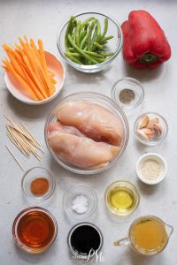 Chicken breast ingredients on a white table.