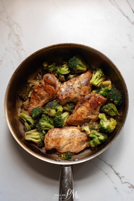 Chicken and broccoli in a skillet.
