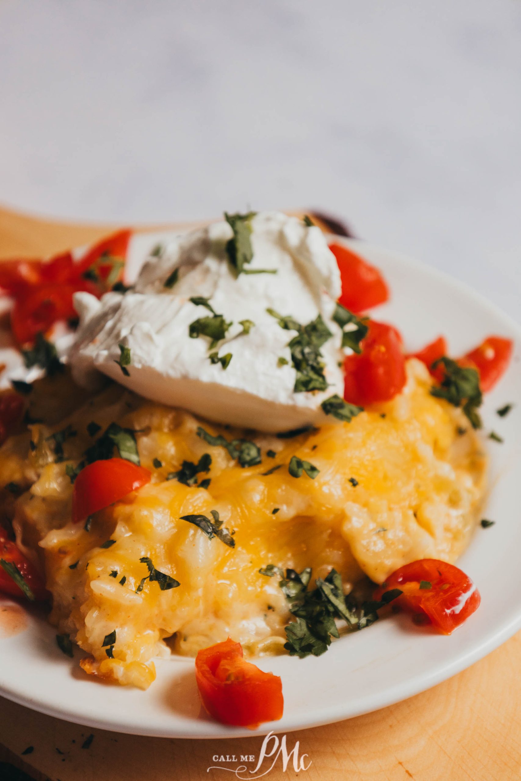 A plate of food with cheese and tomatoes.