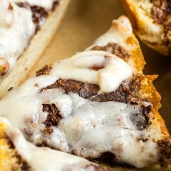 A slice of chocolate cinnamon roll pizza on a plate.