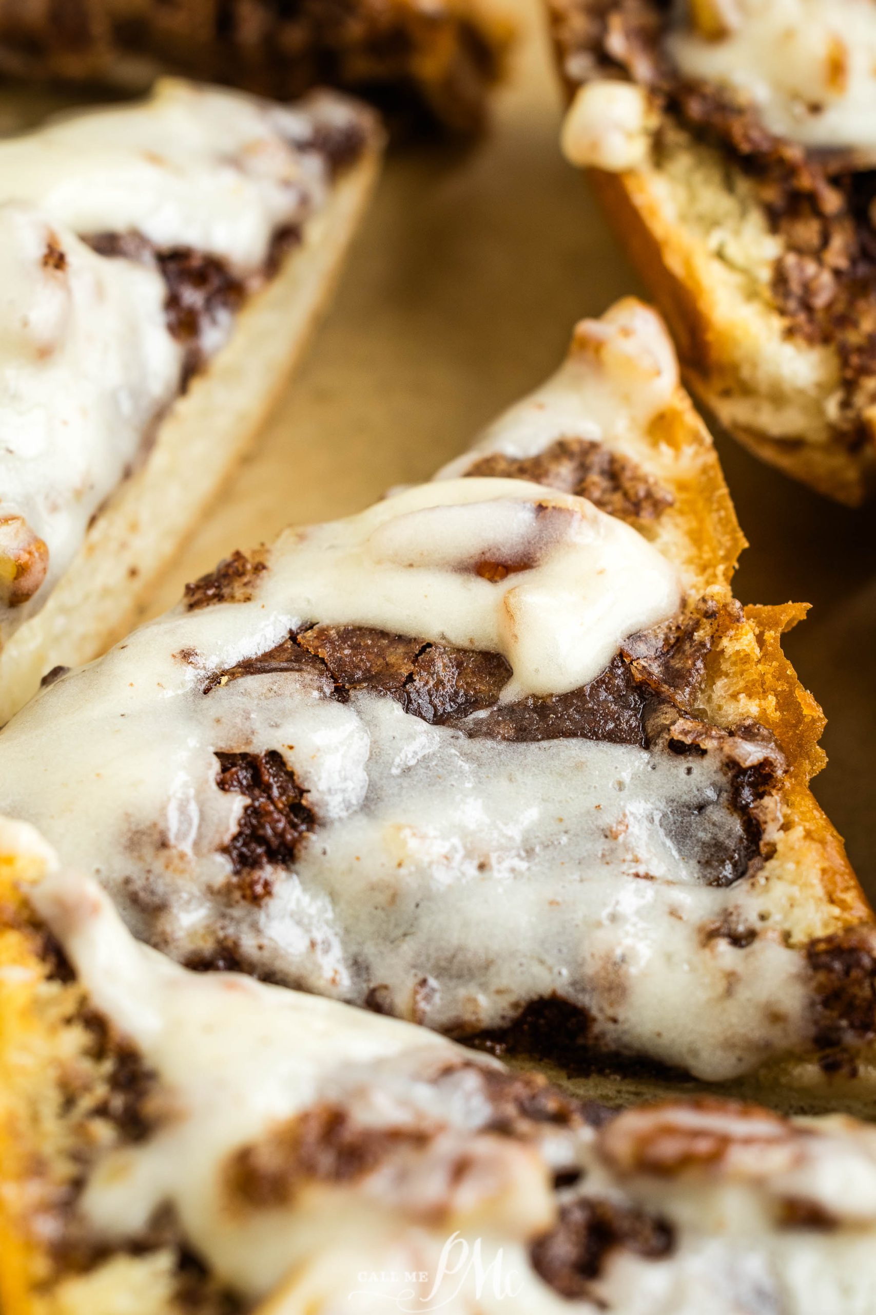 A slice of chocolate cinnamon roll pizza on a plate.