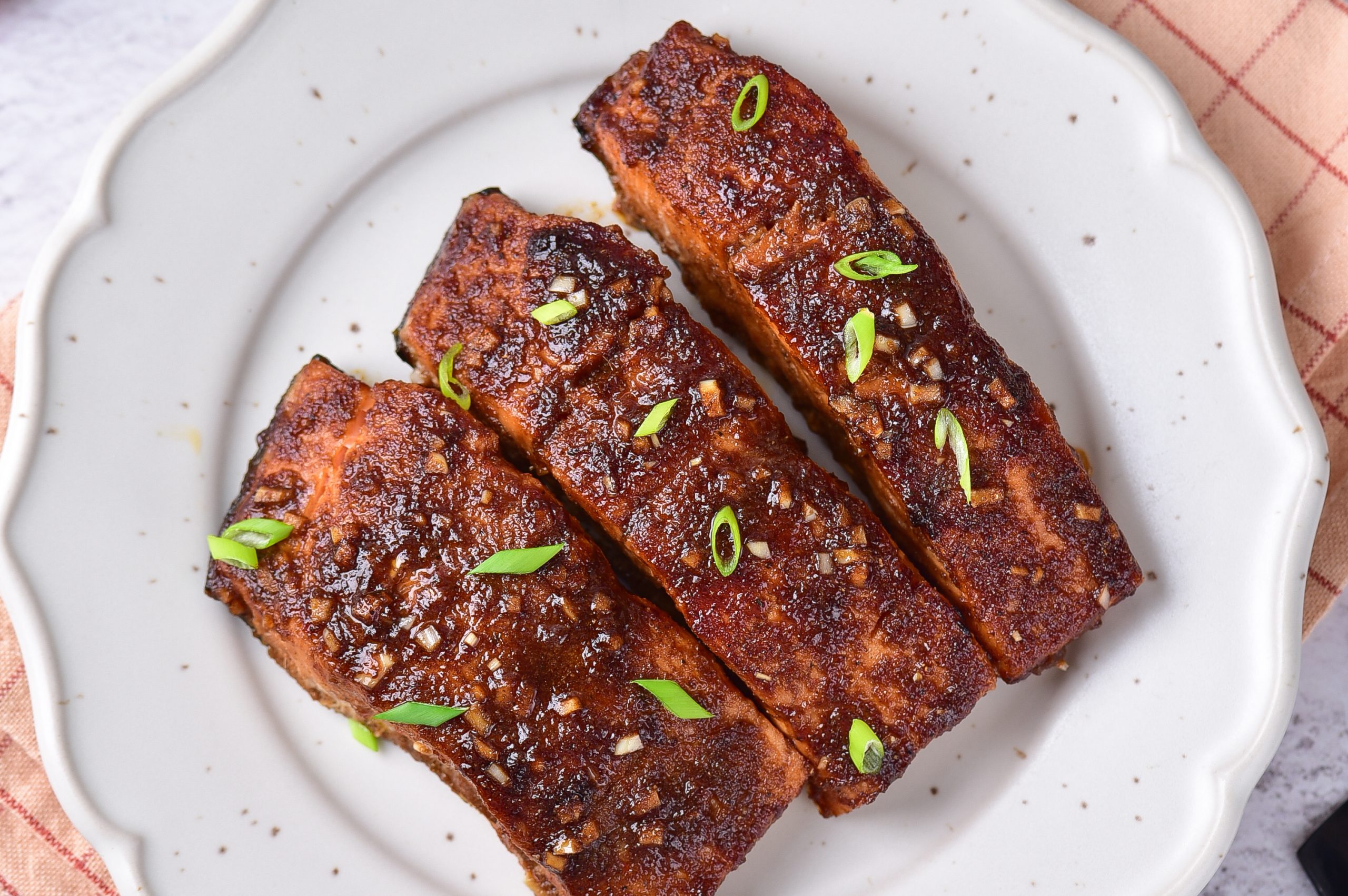 Baked Firecracker Salmon on a white plate.