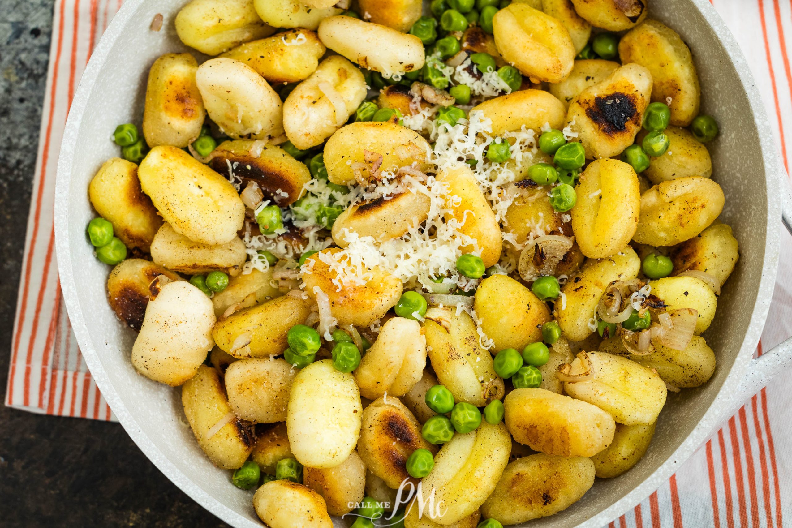 Roasted Garlic Herb Butter Gnocchi with peas and parmesan.