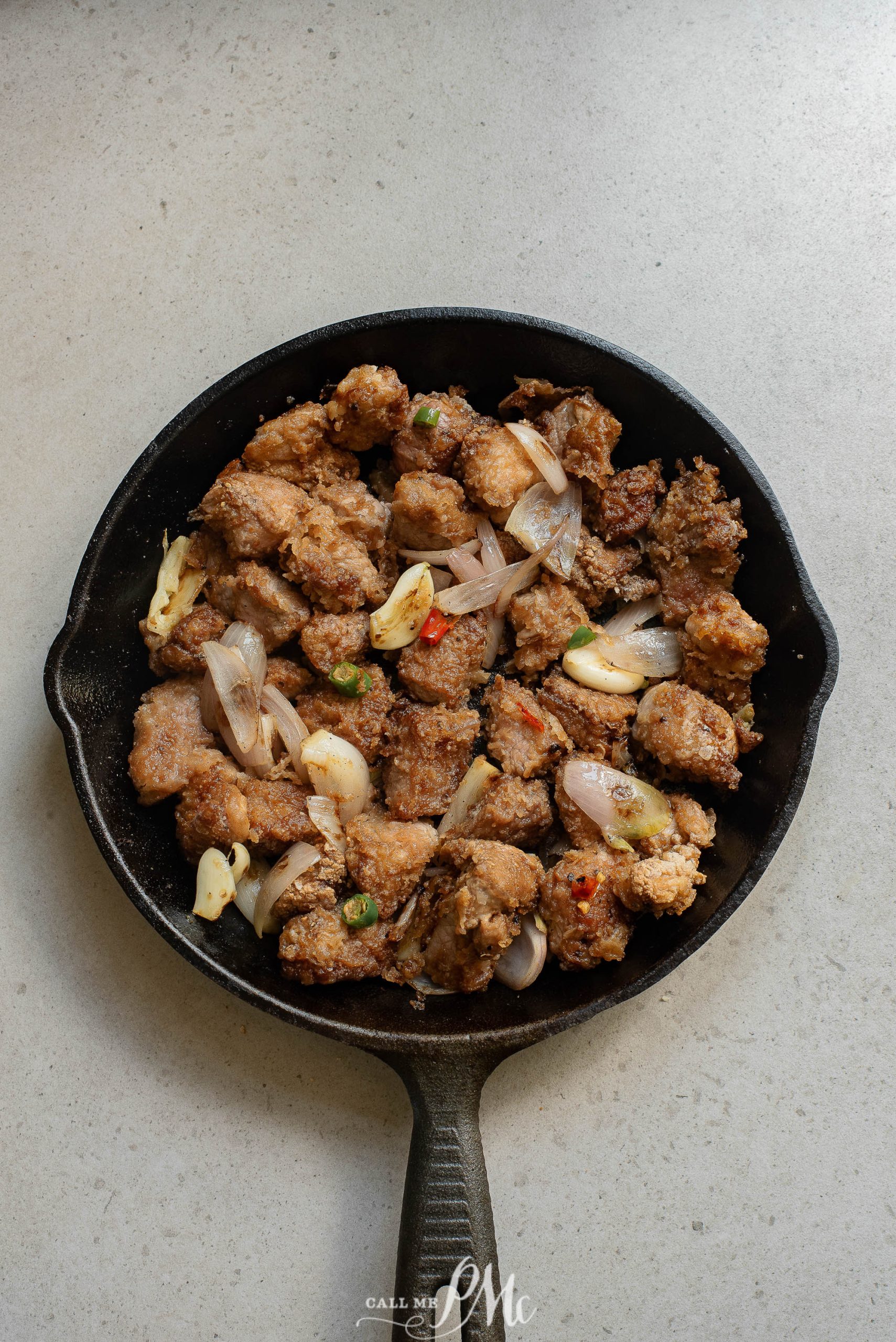 A pan of Panko Parmesan Pork Nuggets on a counter.