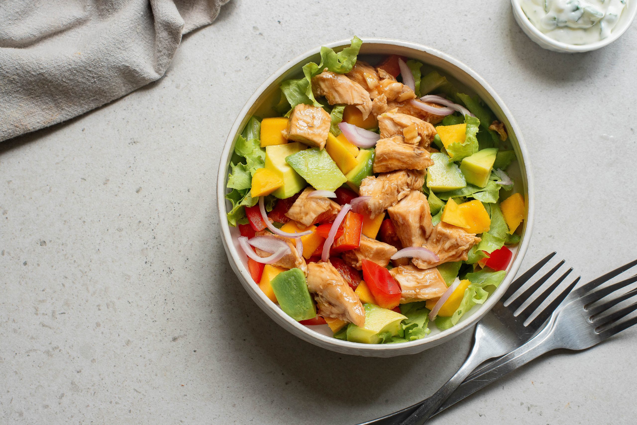 A bowl of Hot Honey Garlic Chicken Salad