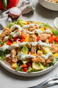 A salad with chicken and vegetables.