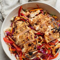 A bowl of food on a table.