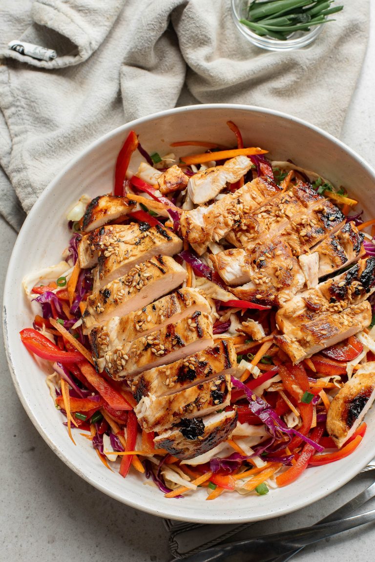 A bowl of food on a table.