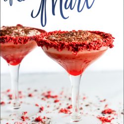 Two glasses of red velvet martini with the text red velvet martini.