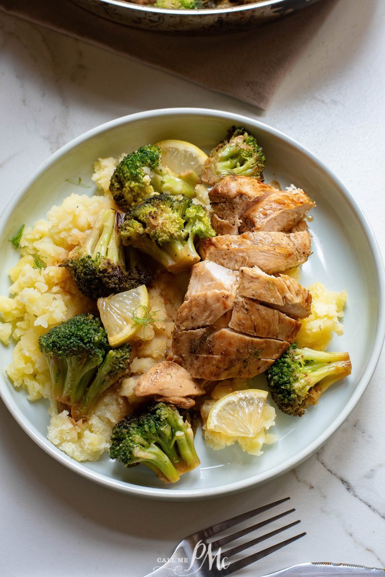 Grilled chicken breast slices with broccoli and mashed cauliflower on a plate.