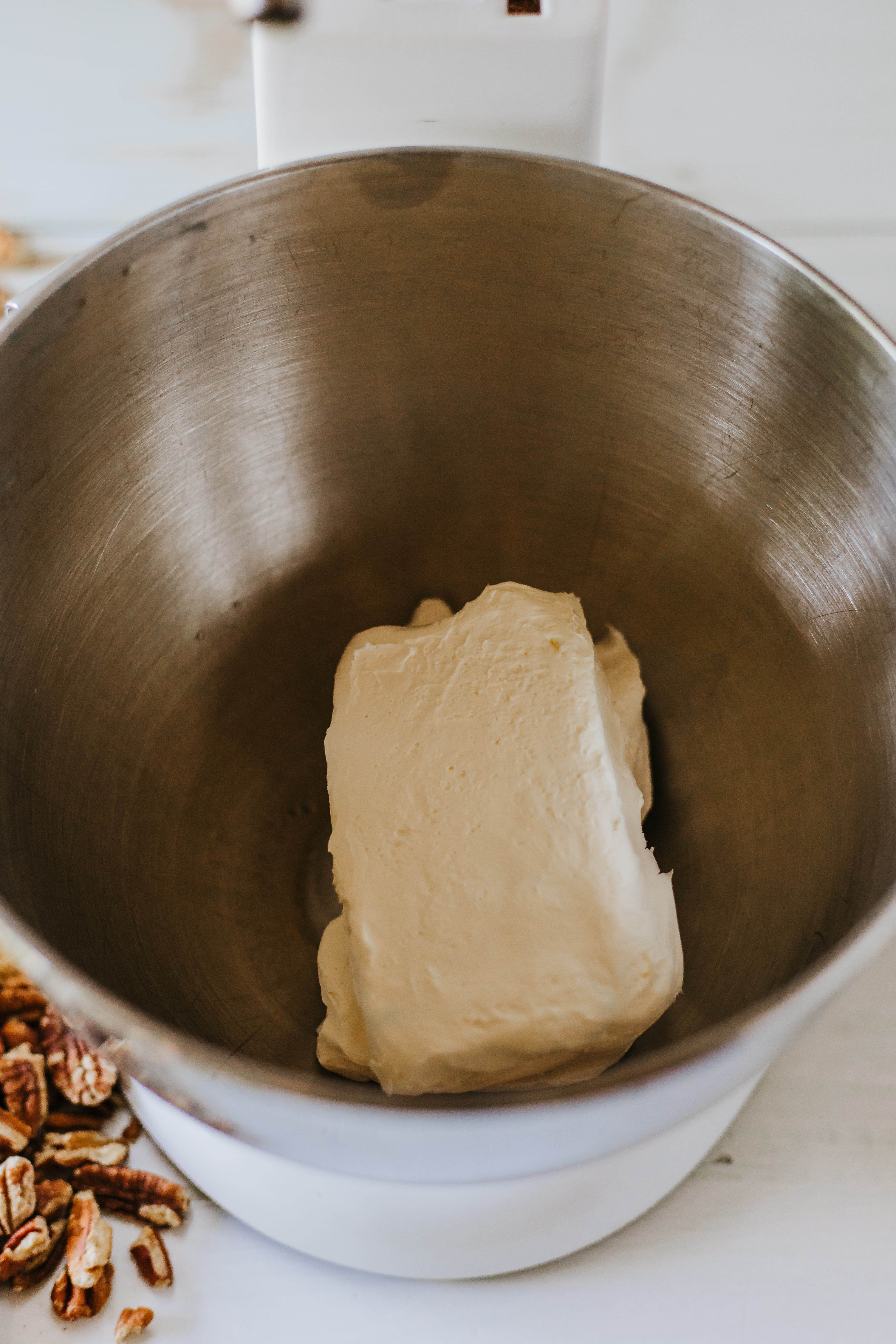 Cream cheese in a mixing bowl.