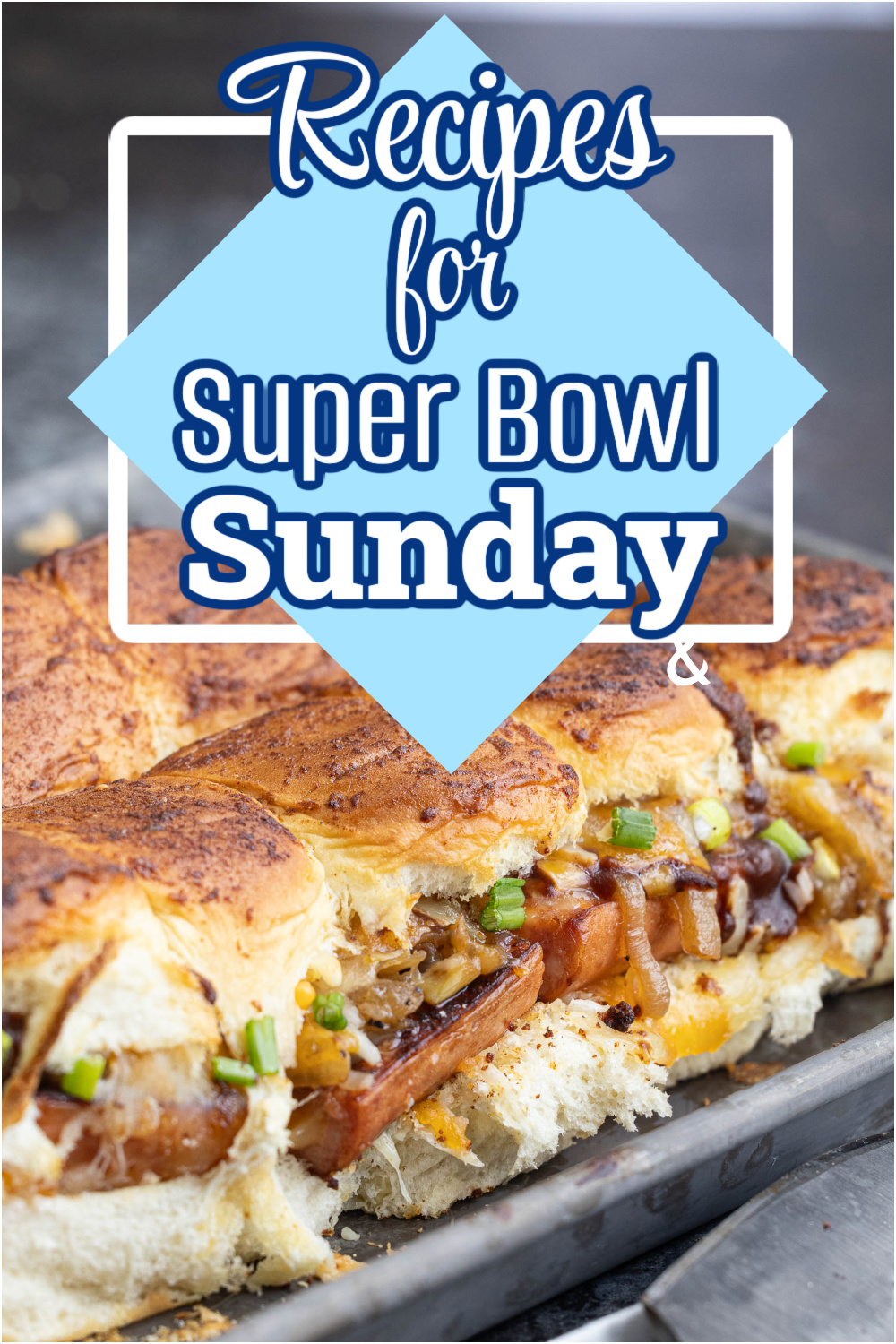 Close-up of sandwich rolls with melted cheese, sausage, and garnished with green onions. Overlay text reads, "Recipes for Super Bowl Sunday.