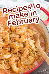A pan of spaghetti with shrimp in a creamy sauce. Text overlay reads, "Recipes to make in February.