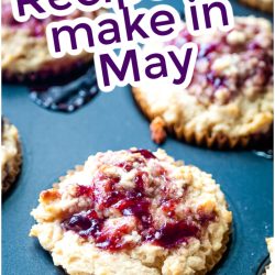 Assorted berry muffins in paper liners on a baking tray with the text "Cook in May: Recipes to make" overlaid at the top.